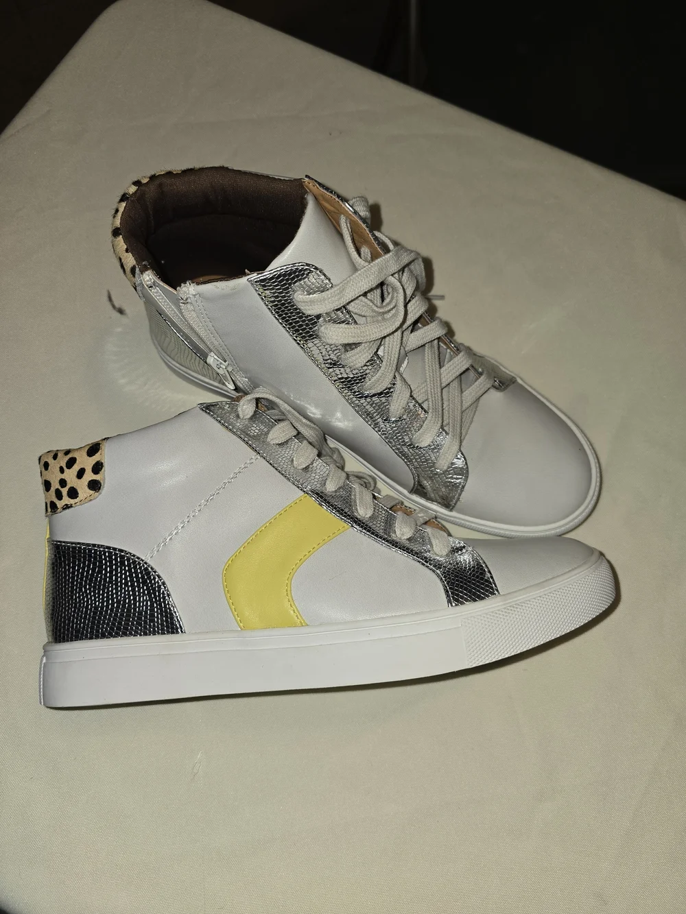 Dolce Vita White High-Top Sneakers with Yellow and Silver Accents